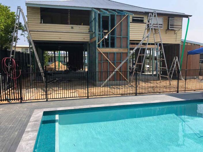 Coastal Modern Builders - Queenslander house relocation and renovation, adding interior stairs - Gold Coast
